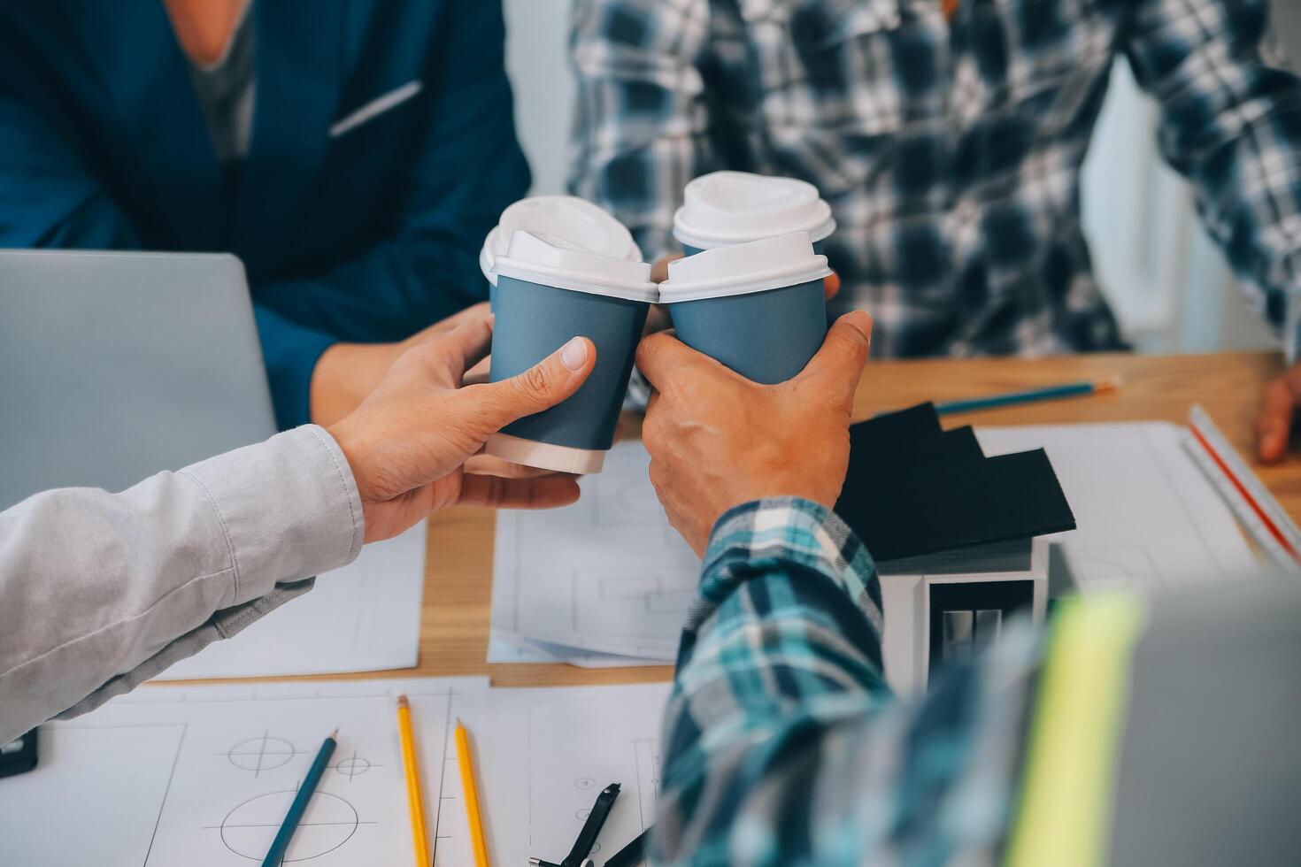 Image of engineer meeting for architectural project. working with partner and engineering tools on workplace vintage tone. photo