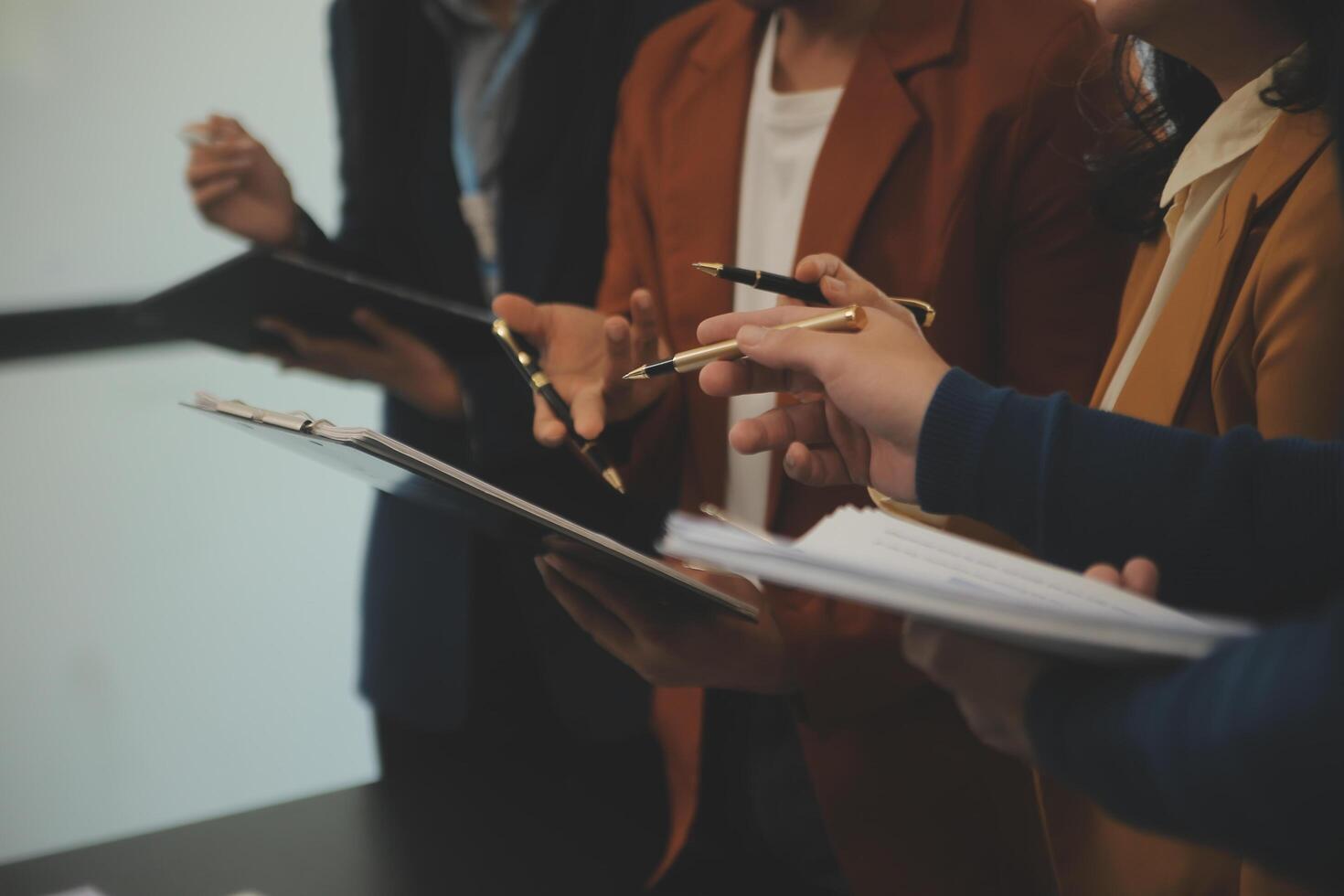 Business team collaboration discussing working analyzing with financial data and marketing growth report graph in team, presentation and brainstorming to strategy planning making profit of company. photo