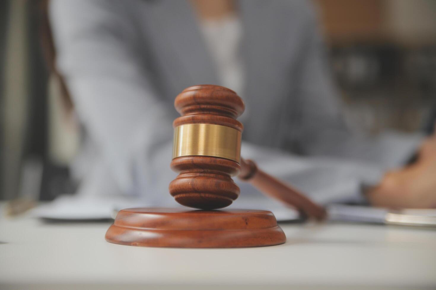 Lawyer, legal advisor, businessman brainstorming information on agreement details Business contracts in legal processing books for accuracy in contract documents. joint financial investment. photo