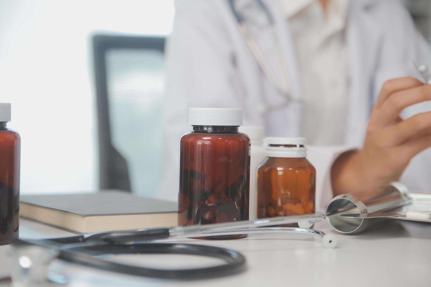 Healthcare service and pharmacy worker with customer at store counter for medication explanation. Pharmaceutical advice and opinion of pharmacist helping girl with medicine information. photo