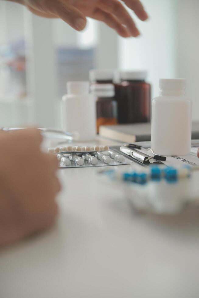 Healthcare service and pharmacy worker with customer at store counter for medication explanation. Pharmaceutical advice and opinion of pharmacist helping girl with medicine information. photo