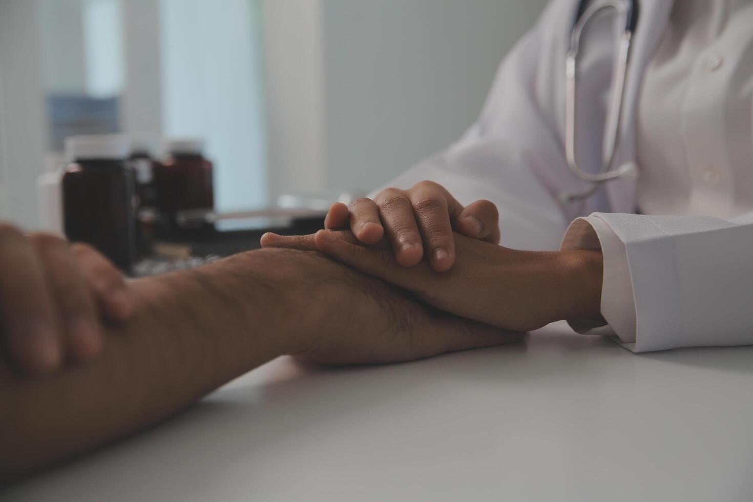 Homecare nursing service and elderly people cardiology healthcare. Close up of young hispanic female doctor nurse check mature caucasian man patient heartbeat using stethoscope during visit photo