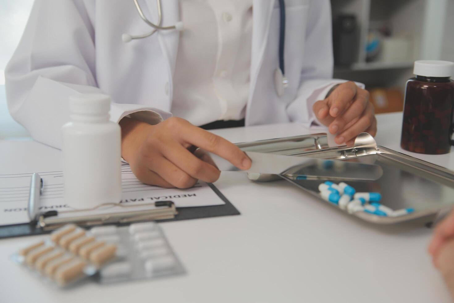 Healthcare service and pharmacy worker with customer at store counter for medication explanation. Pharmaceutical advice and opinion of pharmacist helping girl with medicine information. photo