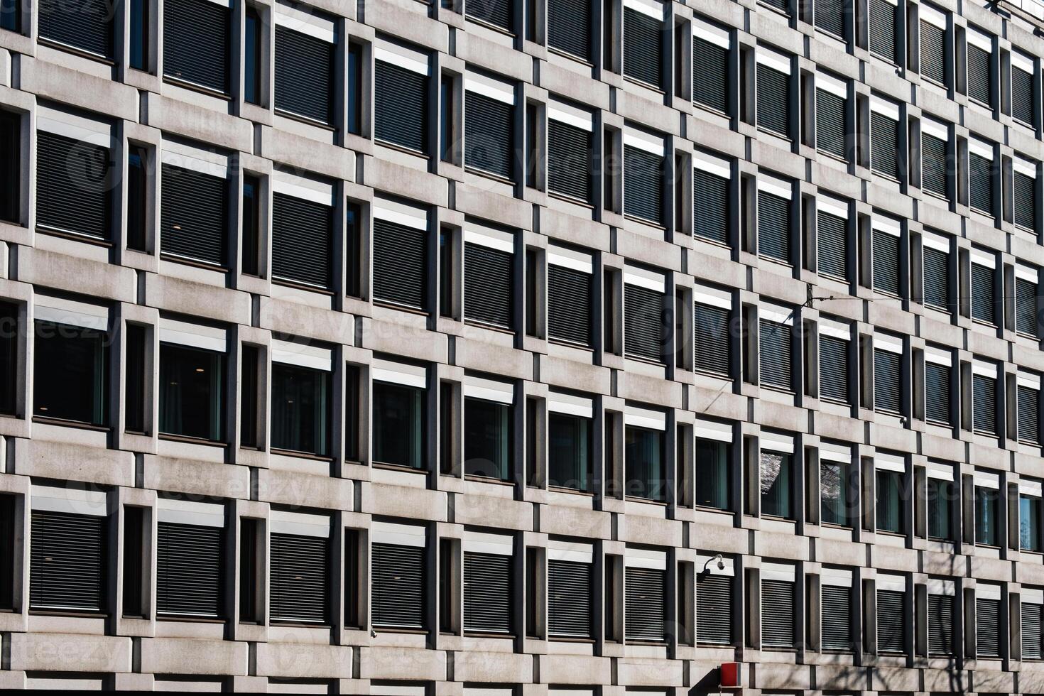 sin costura bloquear de ventanas en hormigón oficina edificio foto