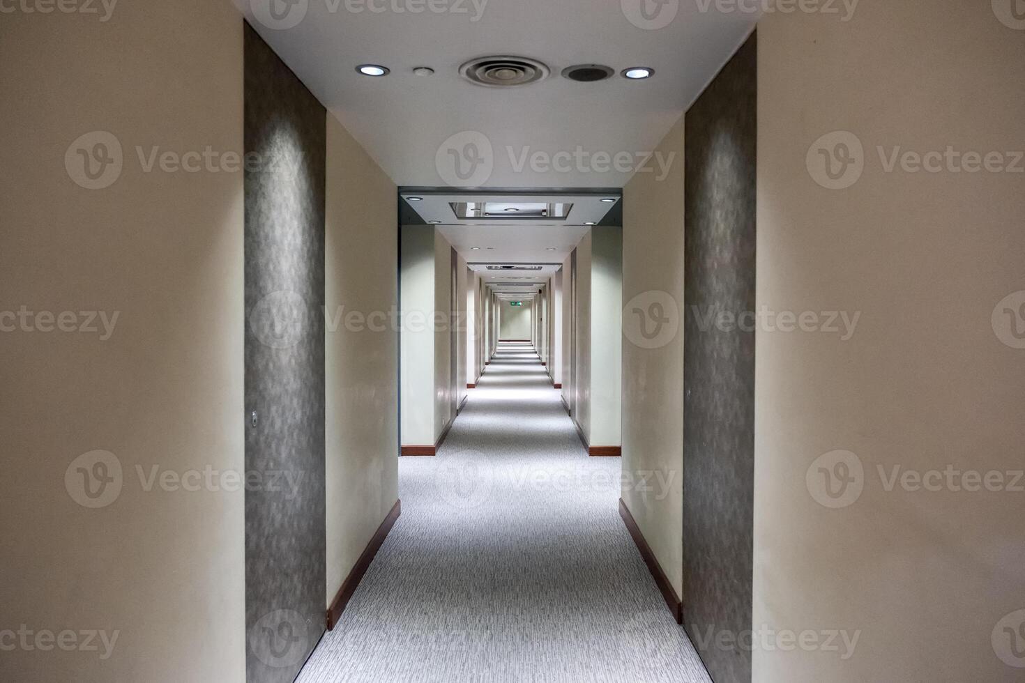 Empty corridor with closed rows door with lighting decoration photo