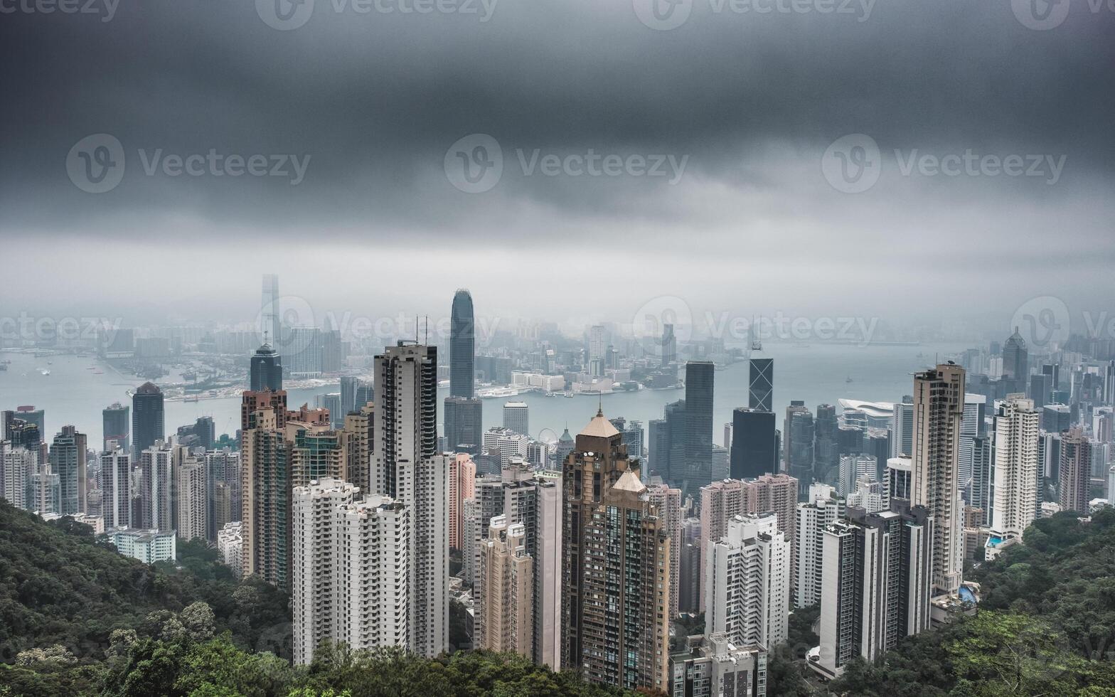 View skyline building with storm in rainy season at Victoria Peak photo