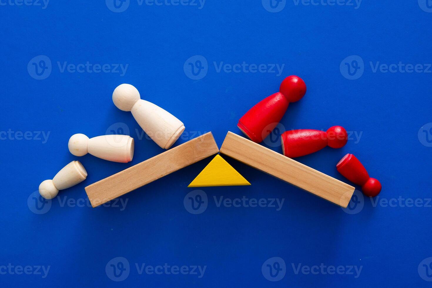 Team standing on a wooden seesaw, one side winner and one side loser. Success and failure. Business and workplace competition. Losers and winners. photo