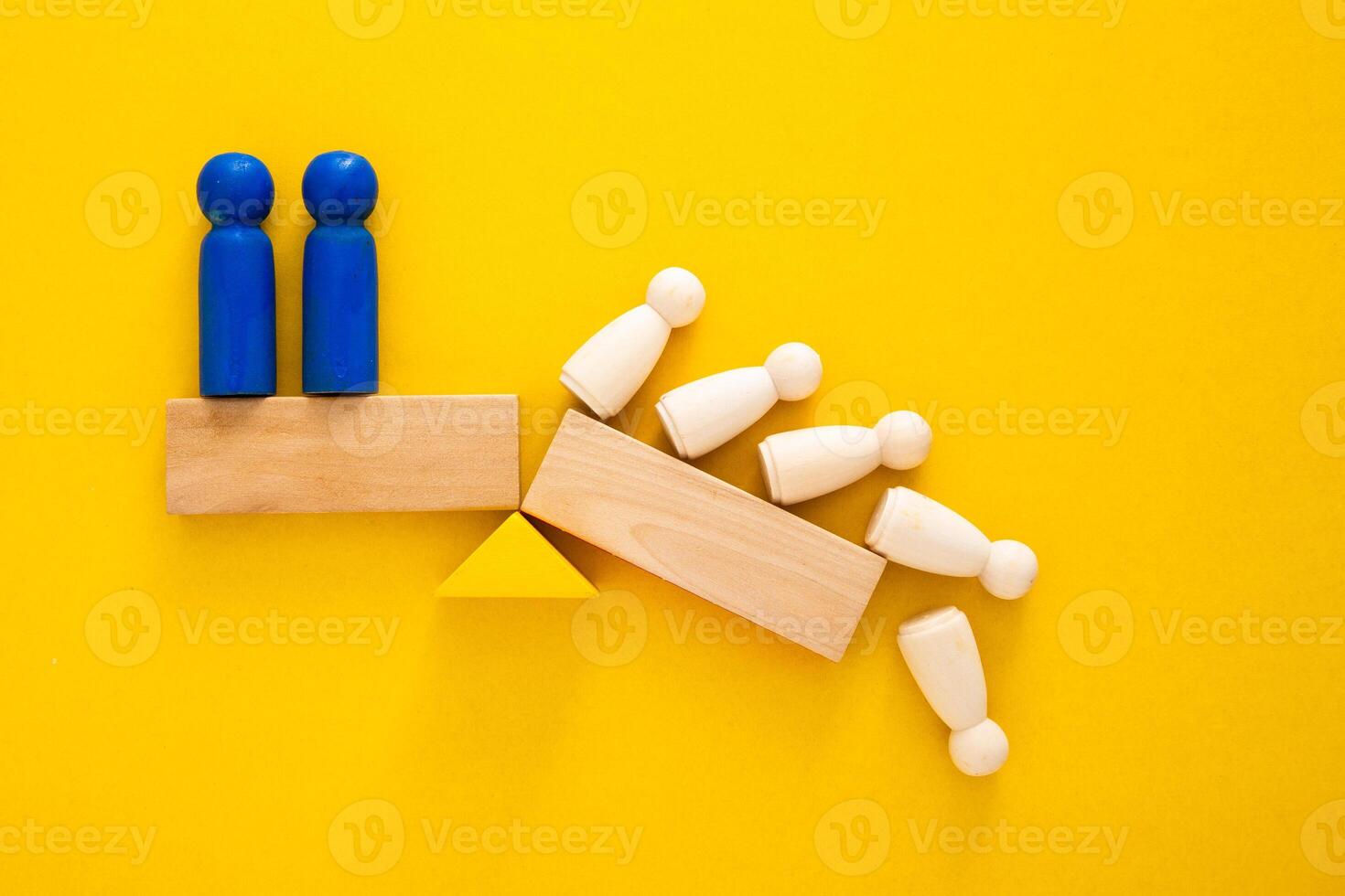 Team standing on a wooden seesaw, one side winner and one side loser. Success and failure. Business and workplace competition. Losers and winners. photo