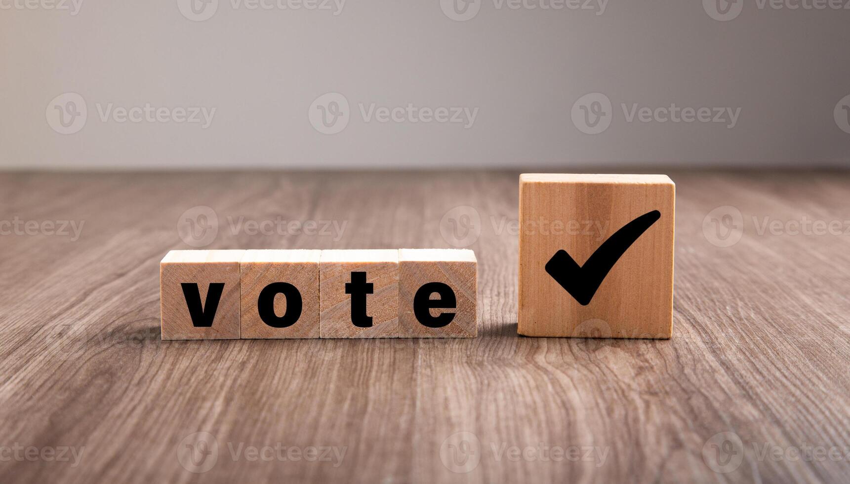 Vote wording on wooden cubes block. photo