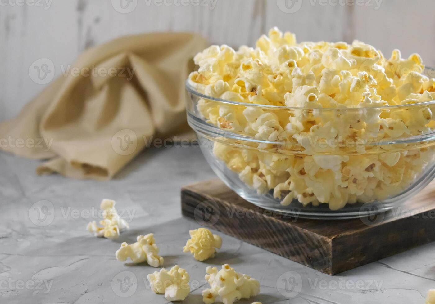 Popcorn on a wooden background photo