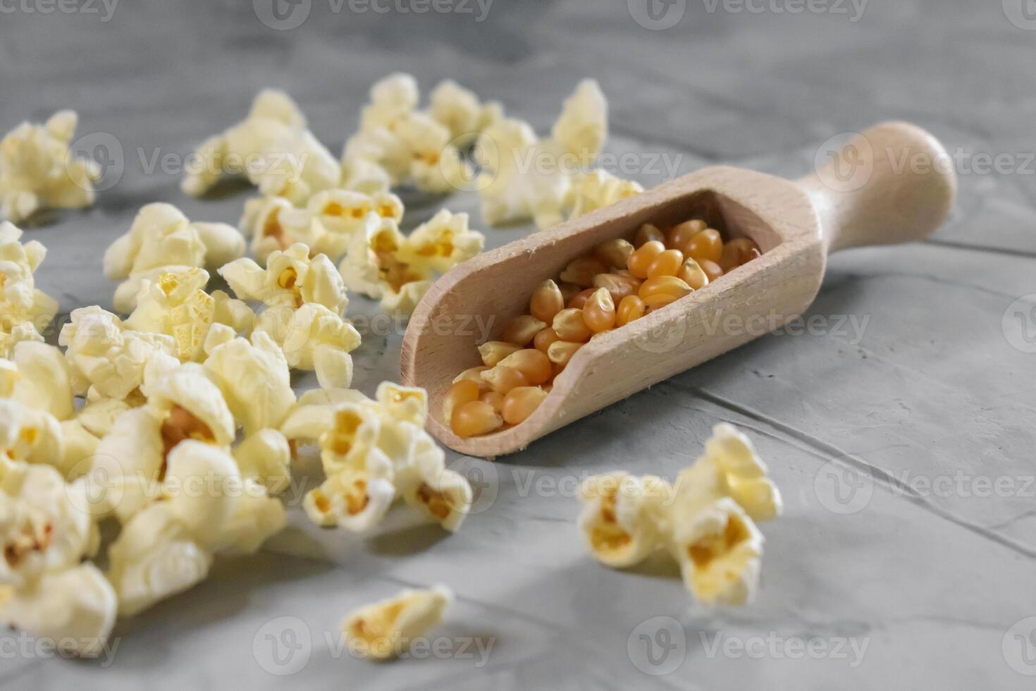 Popcorn on a wooden background photo