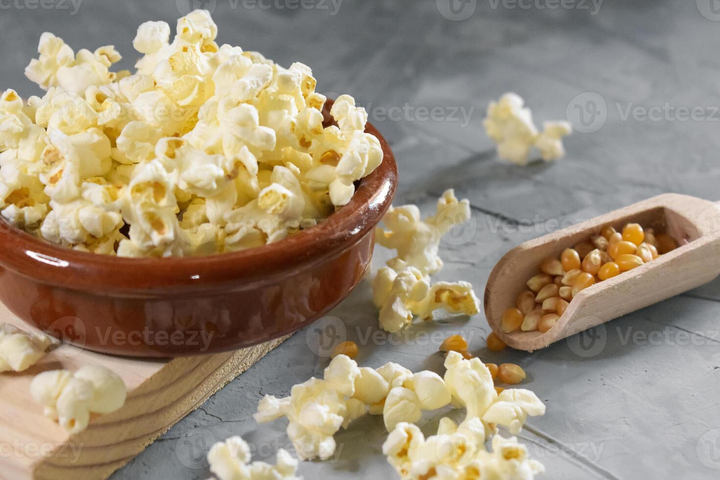 Popcorn on a wooden background photo