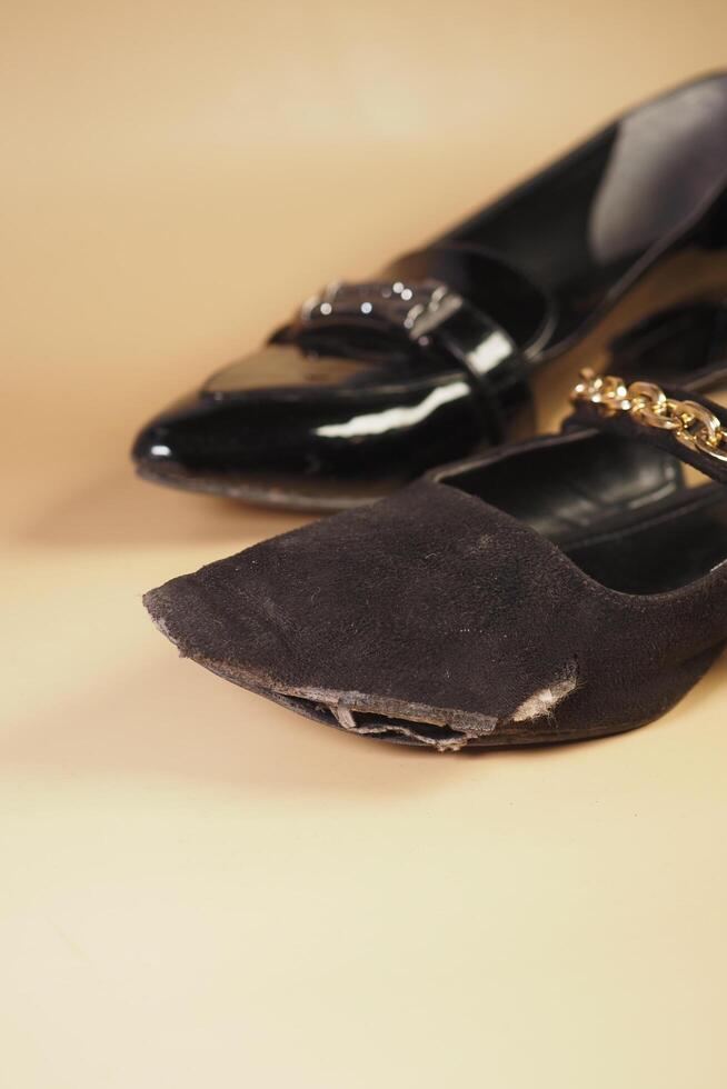 damaged women old worn torn shoes, photo