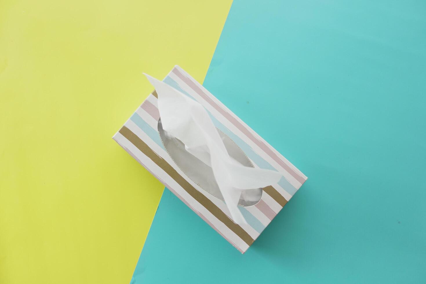 tissue box on color background. Healthcare and hygiene. photo