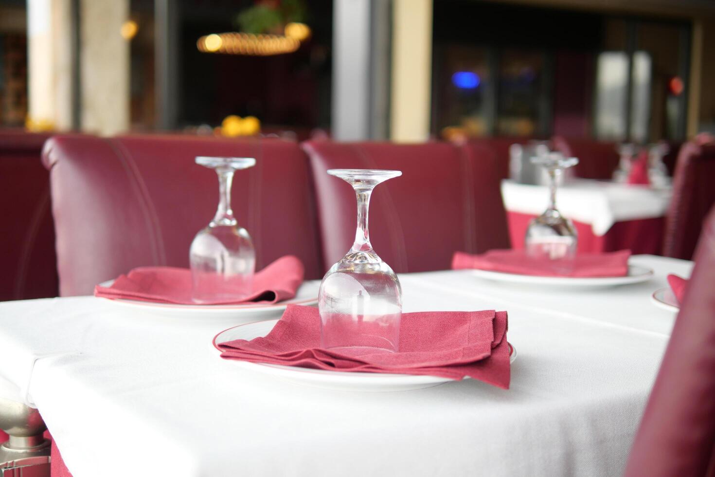 served and decorated round festive table in a restaurant photo