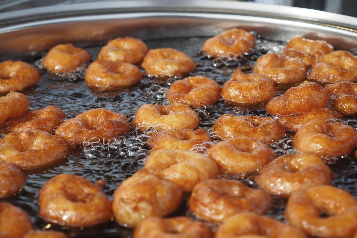 Traditional fried sweets lokma in sugar syrup photo