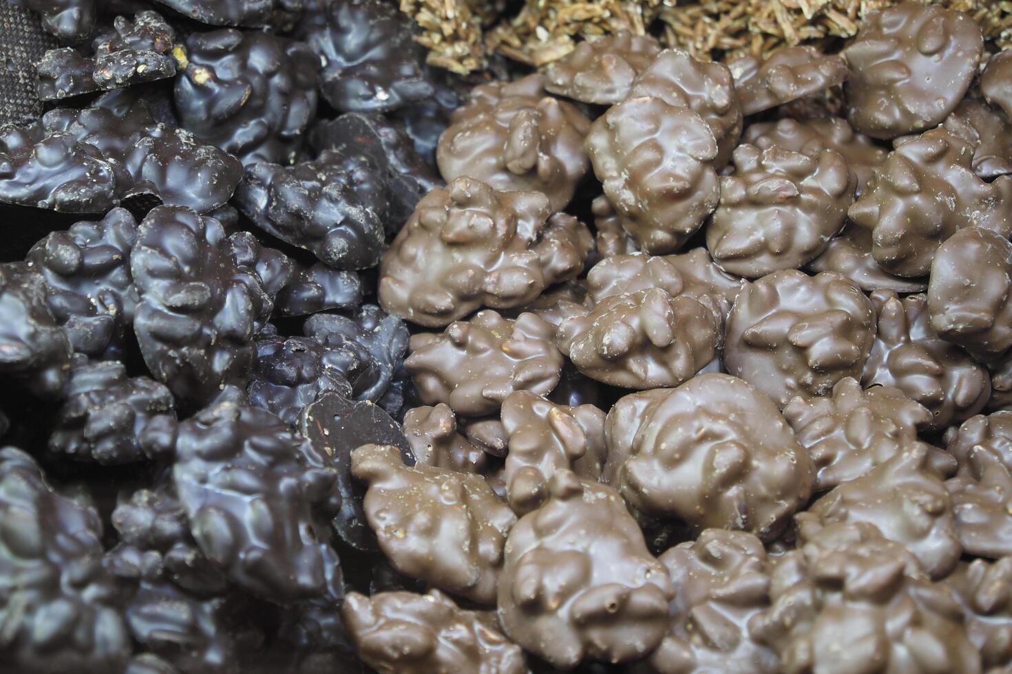 close up of peanut chocolate candy on table photo