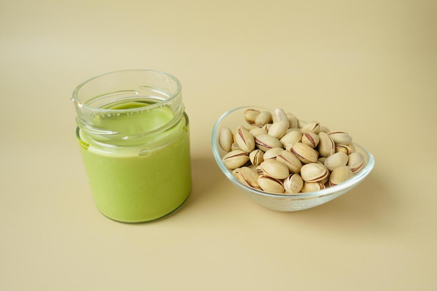 top view a pistachios cream and nuts in a bowl photo