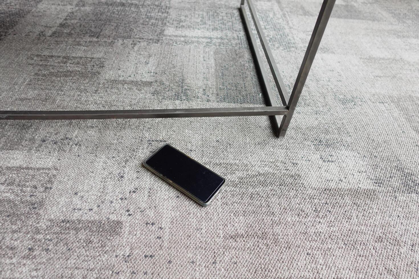 forget smartphone on floor at home photo