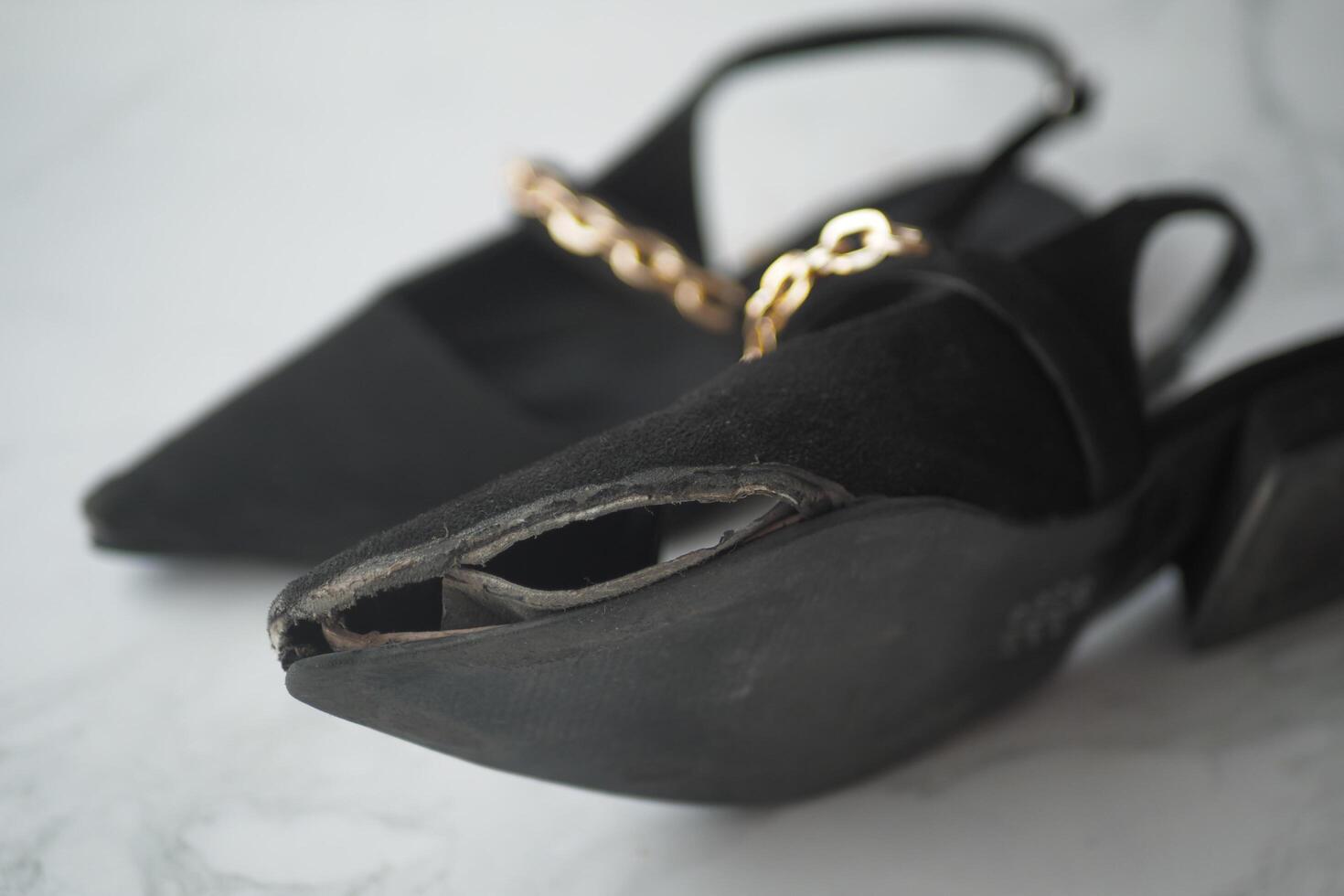 damaged women old worn torn shoes, photo