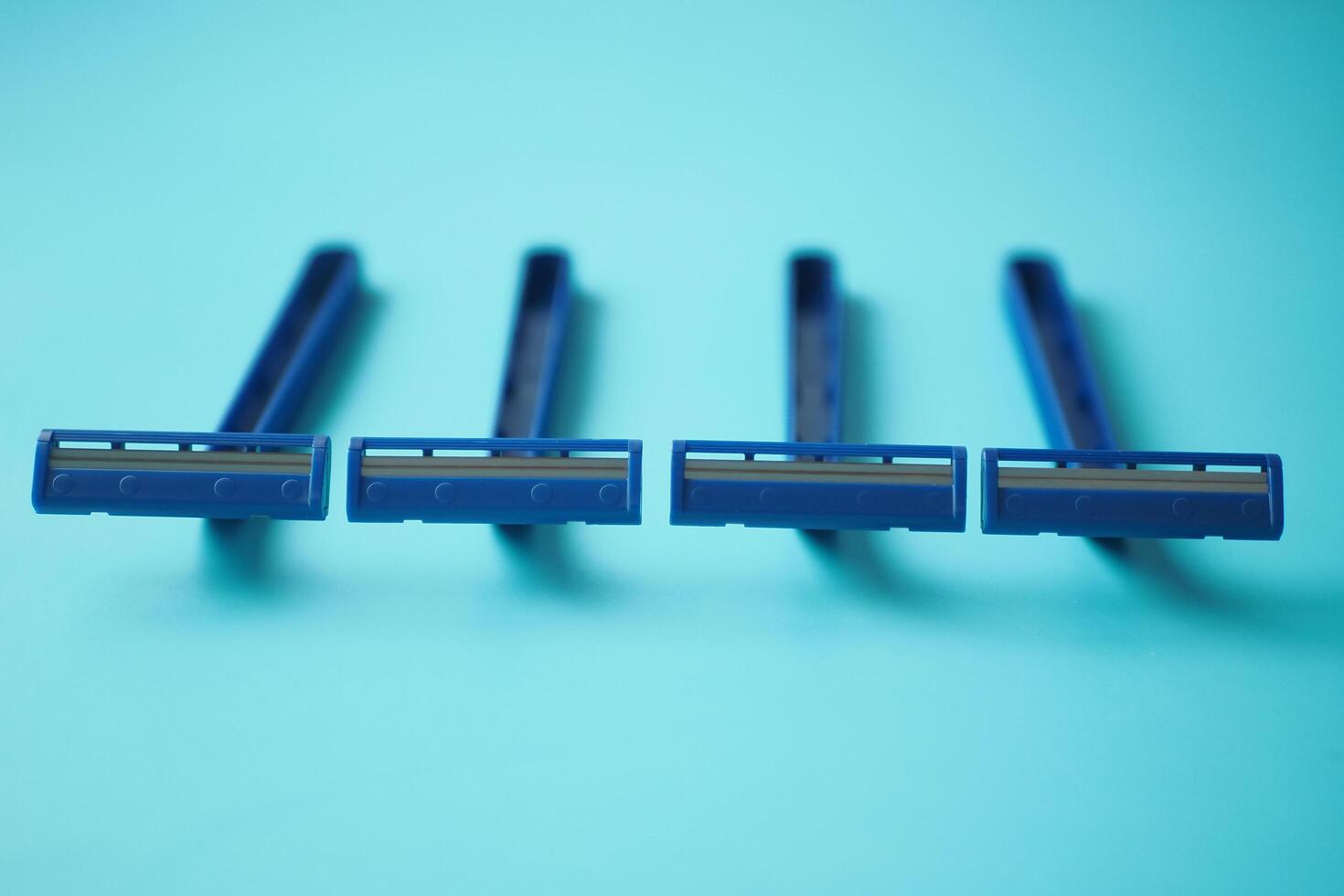 black color Razor on gray background close up. photo
