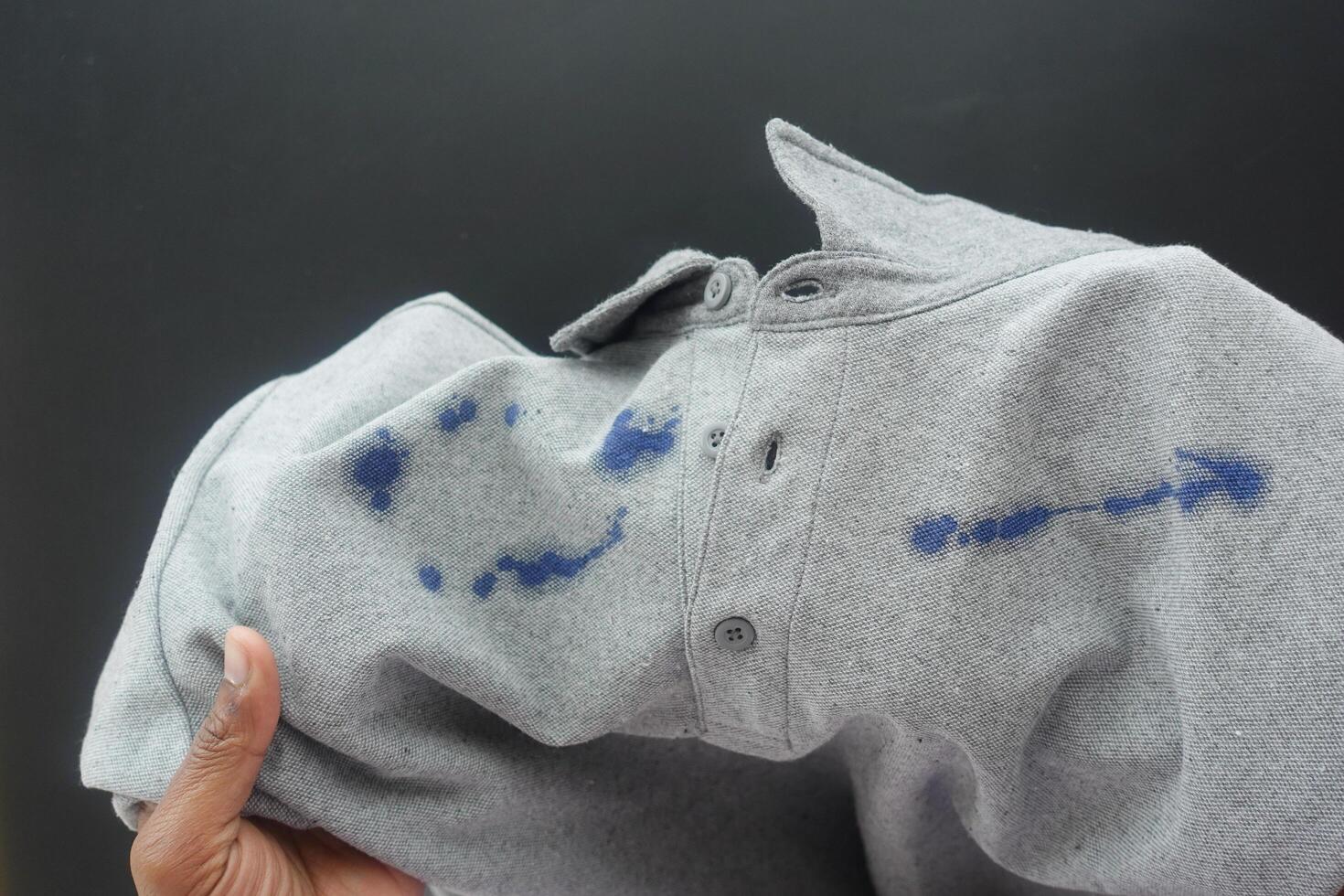 shirt with blue ink stain . photo