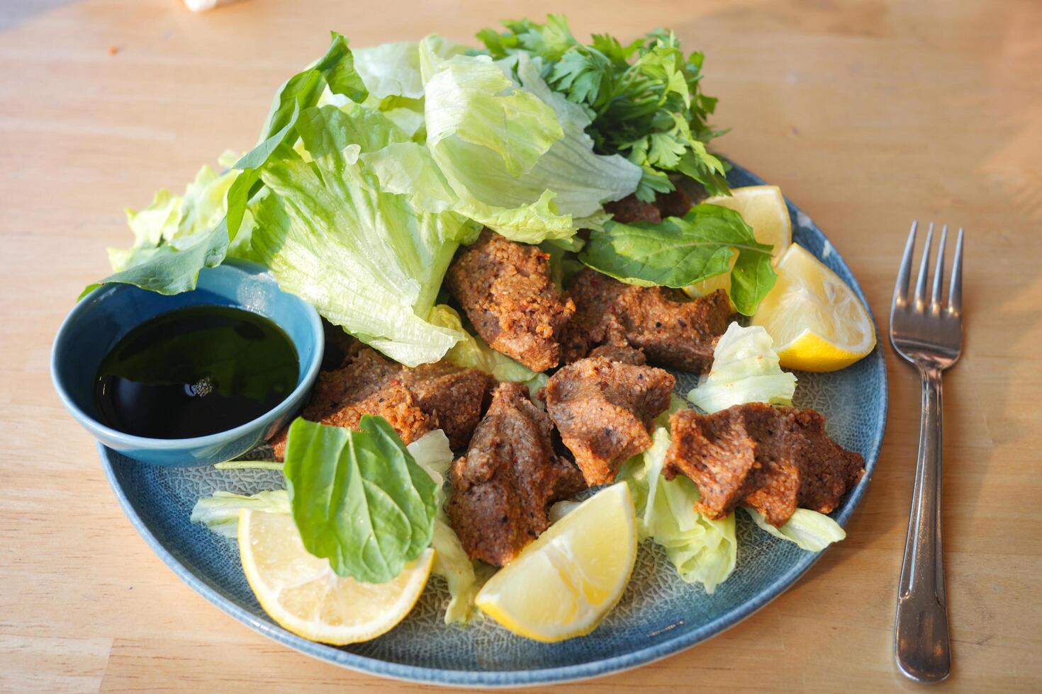 Raw meatballs or cig kofte. Traditional Turkish cuisine delicacies. photo