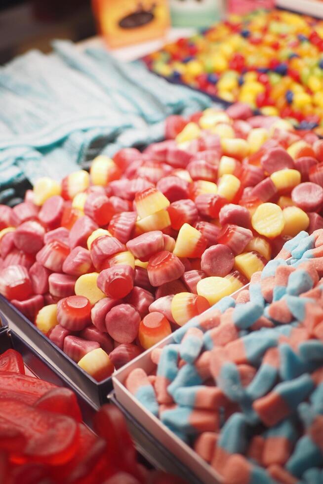 Mixed colorful jelly, gummy candies display for sales photo