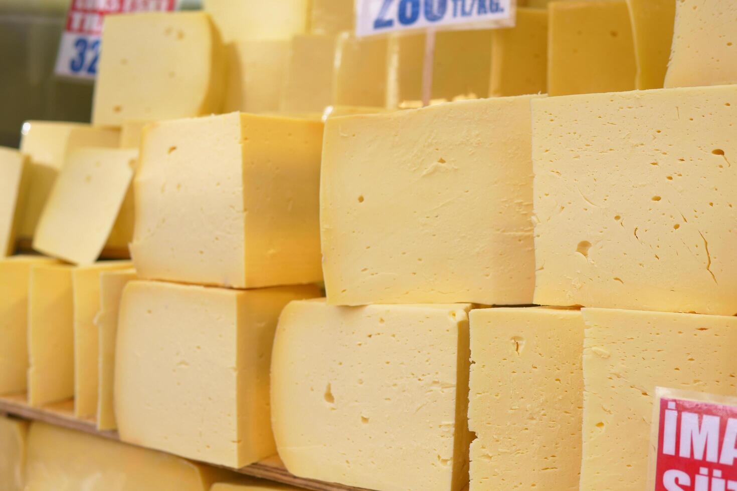 many type of cheeses on shop window photo