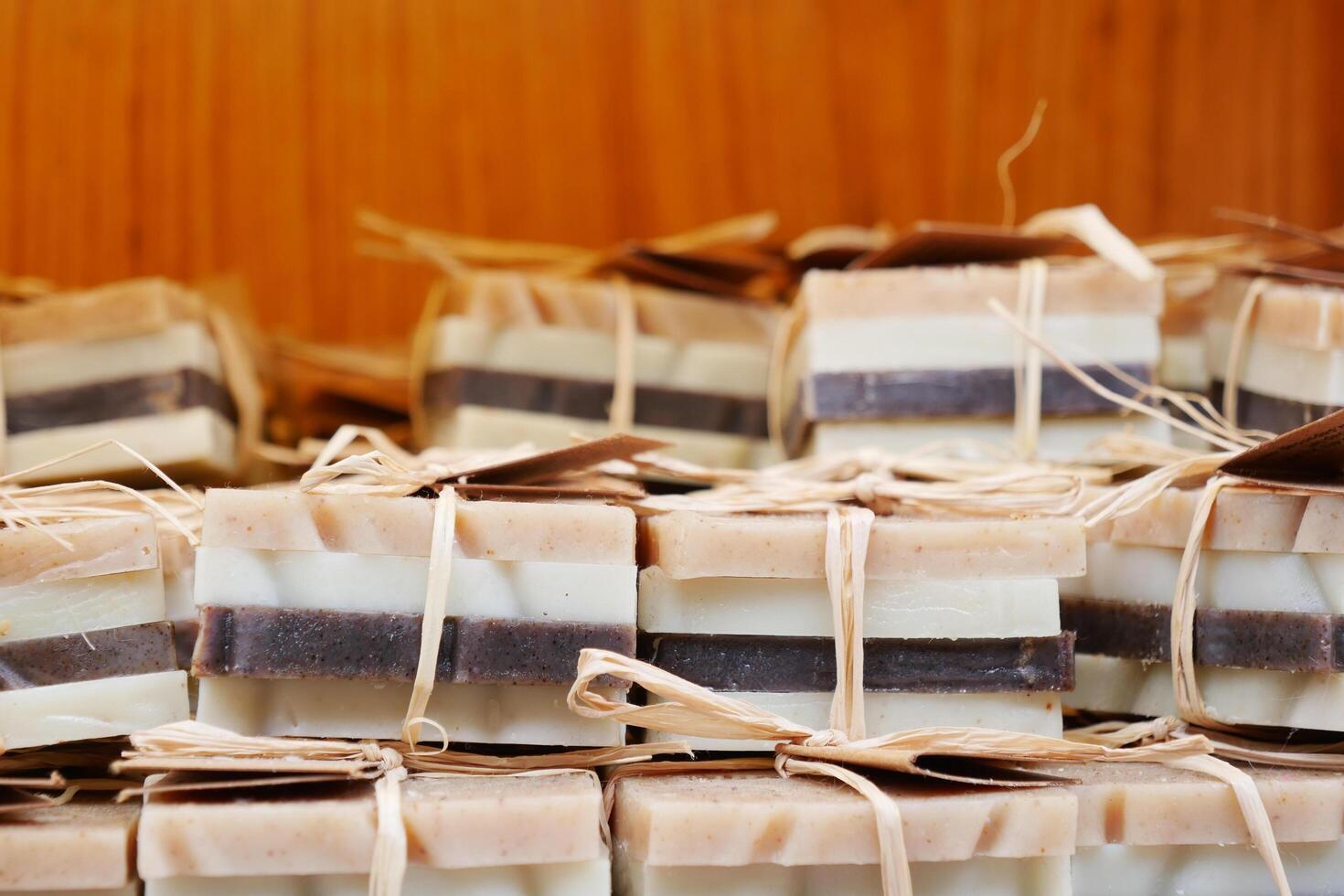 stack of natural soap bar on table photo