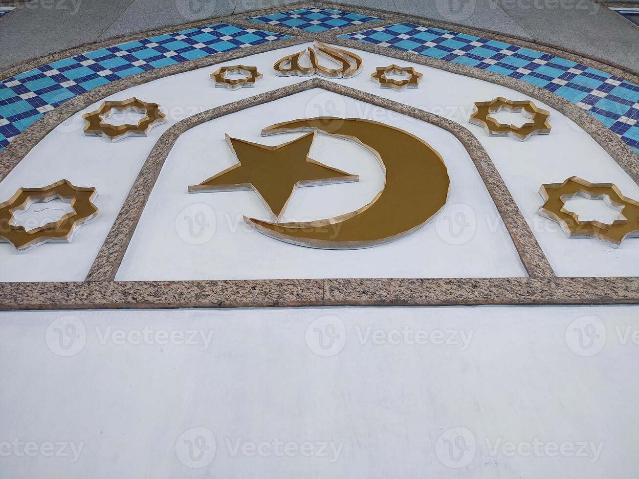 an Arabic pattern depicting the moon and stars which symbolizes the Islamic religion photo