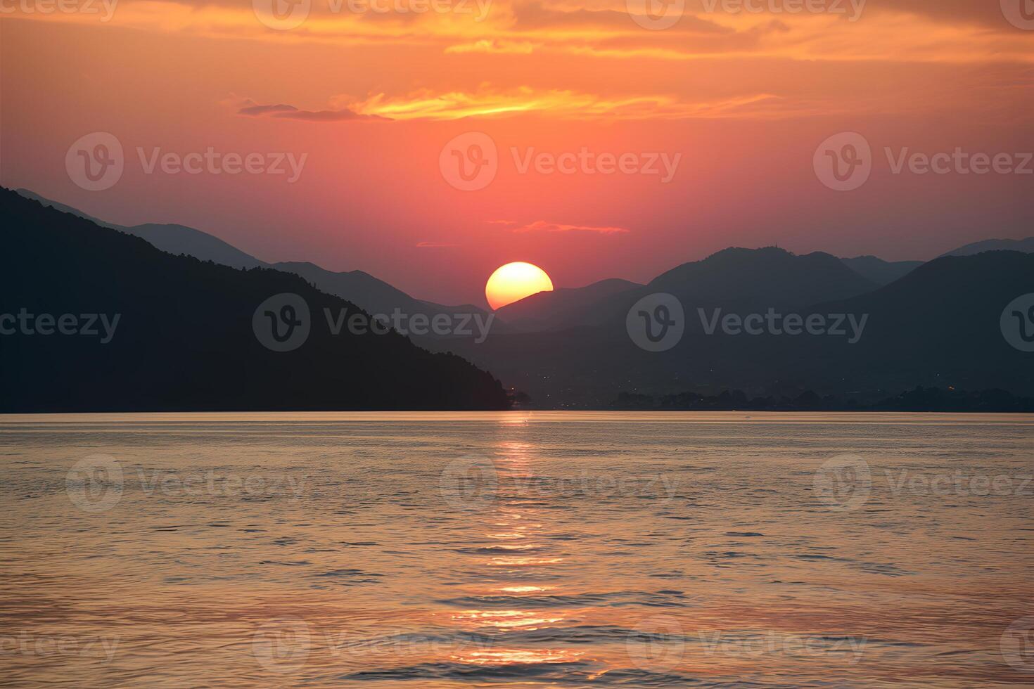 AI generated Mountains provide stunning backdrop to serene sunset over water photo