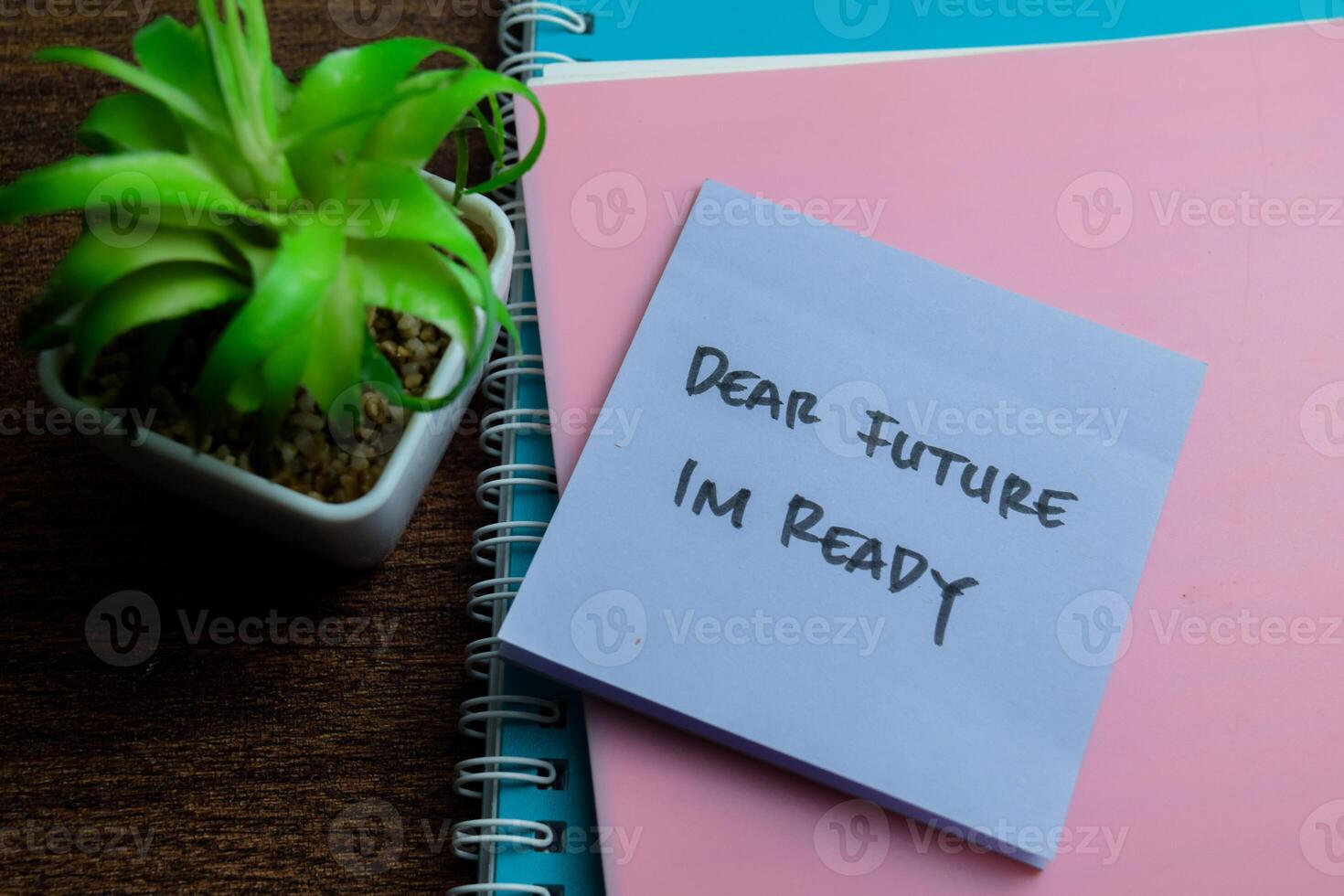 Concept of Dear Future Im Ready write on sticky notes isolated on Wooden Table. photo