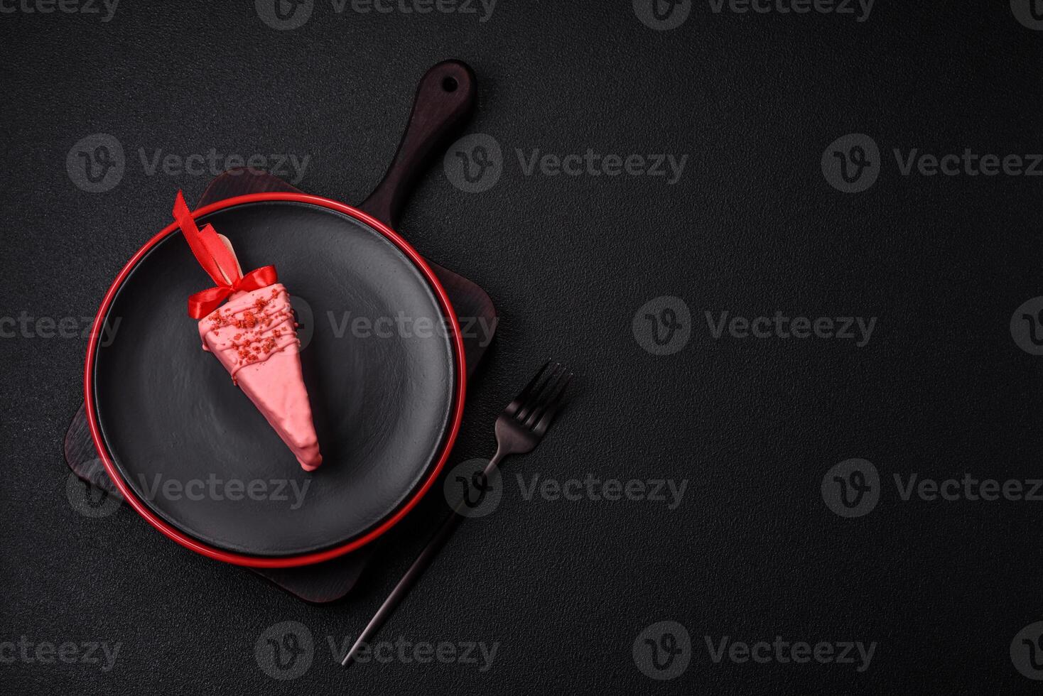 Delicious sweet cheesecake with fruits covered with icing with a wooden stick photo