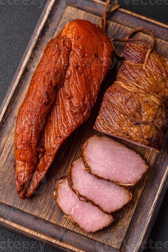Delicious smoked meat pork or chicken with salt, spices and herbs photo