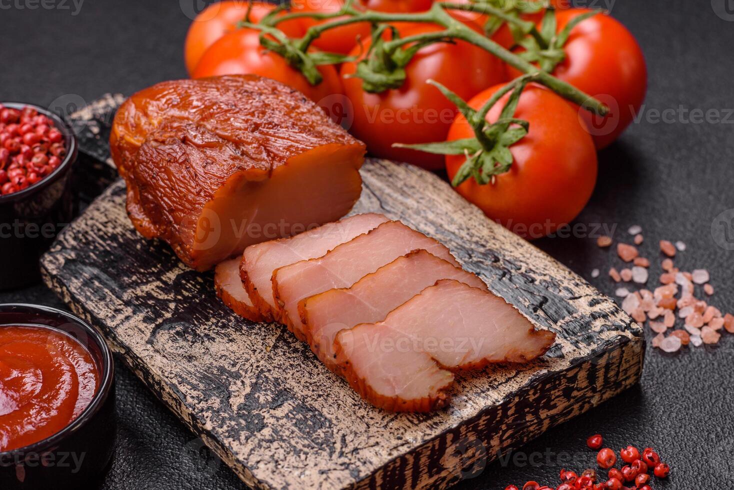 Delicious smoked meat chicken breast with salt, spices and herbs photo