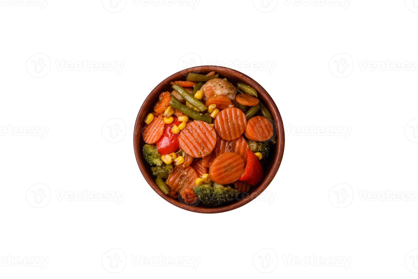 Delicious healthy vegetables steamed carrots, broccoli, asparagus beans and peppers photo