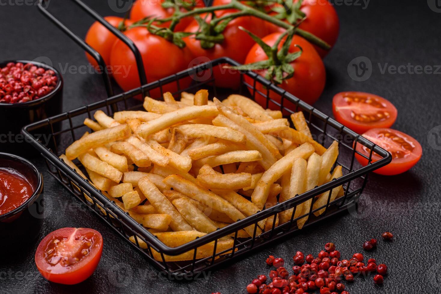 Delicious crispy golden fries with salt and spices photo