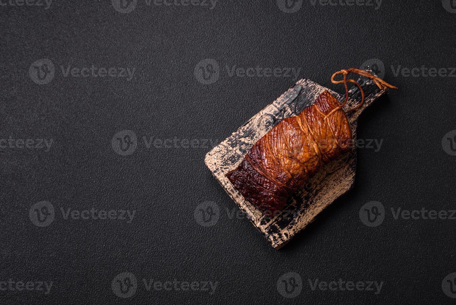 Delicious smoked meat pork or chicken with salt, spices and herbs photo