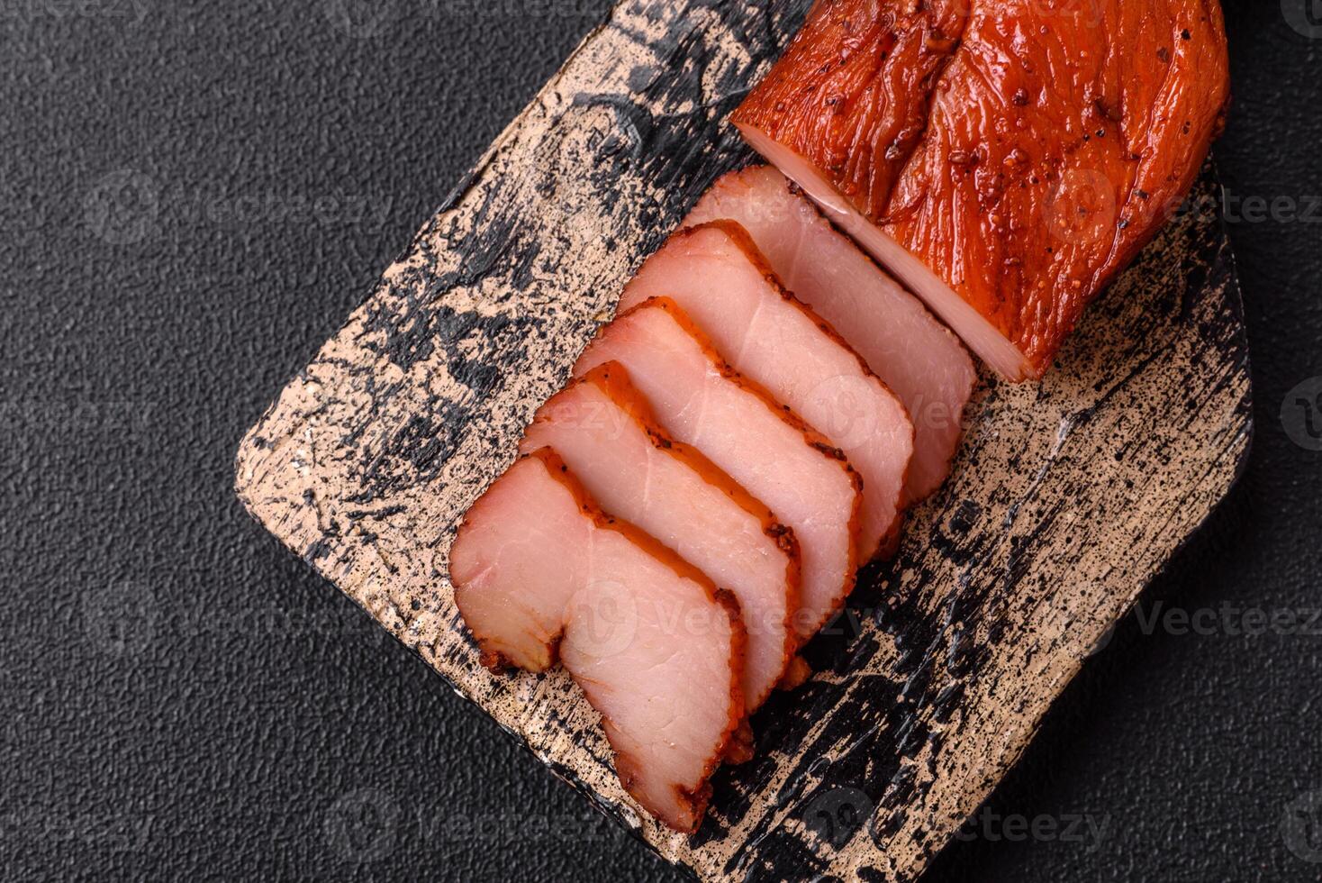 Delicious smoked meat chicken breast with salt, spices and herbs photo