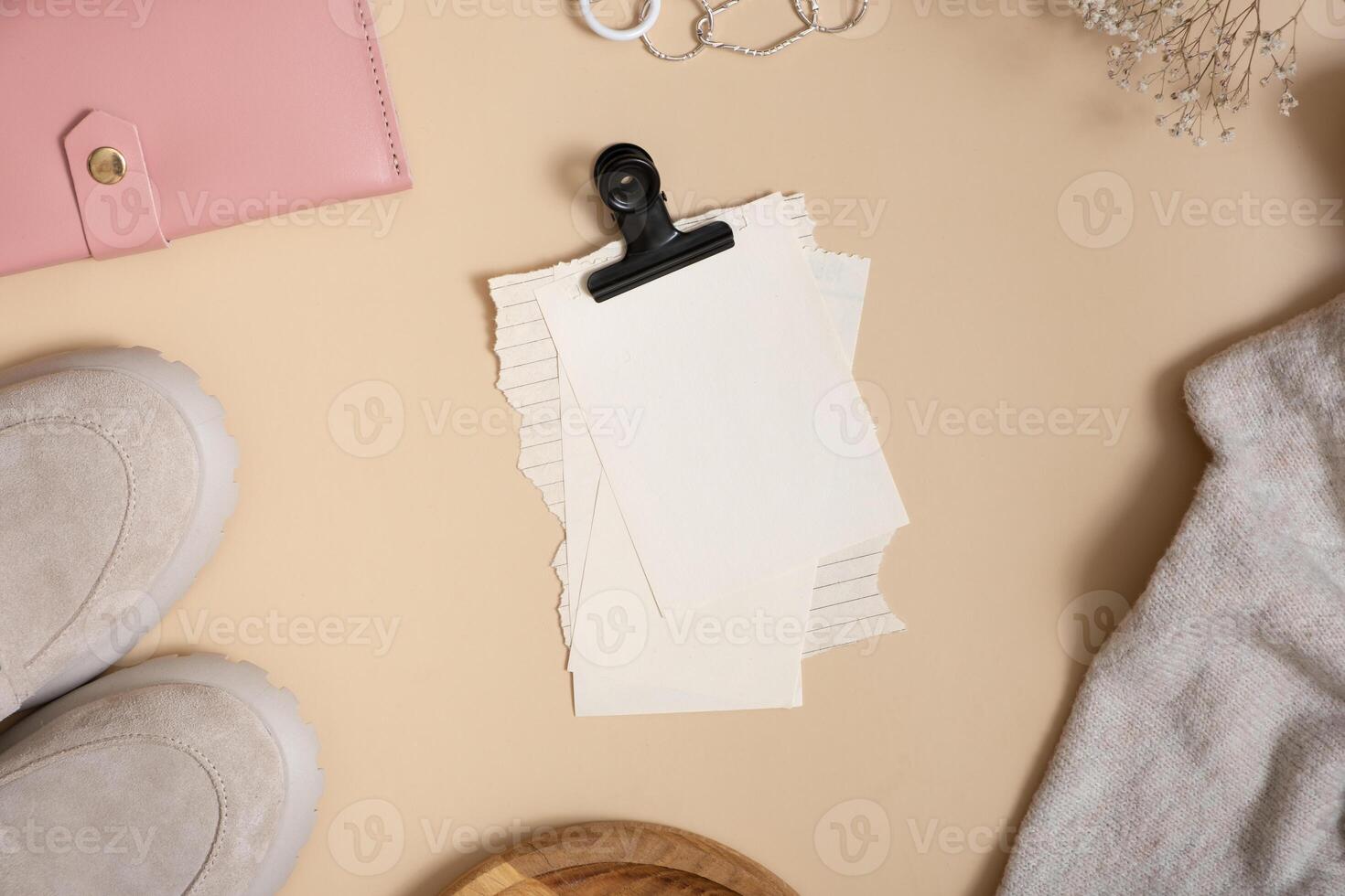 Empty paper and women's shoes, wallet and cosmetics. Shopping, fashion blog concept photo