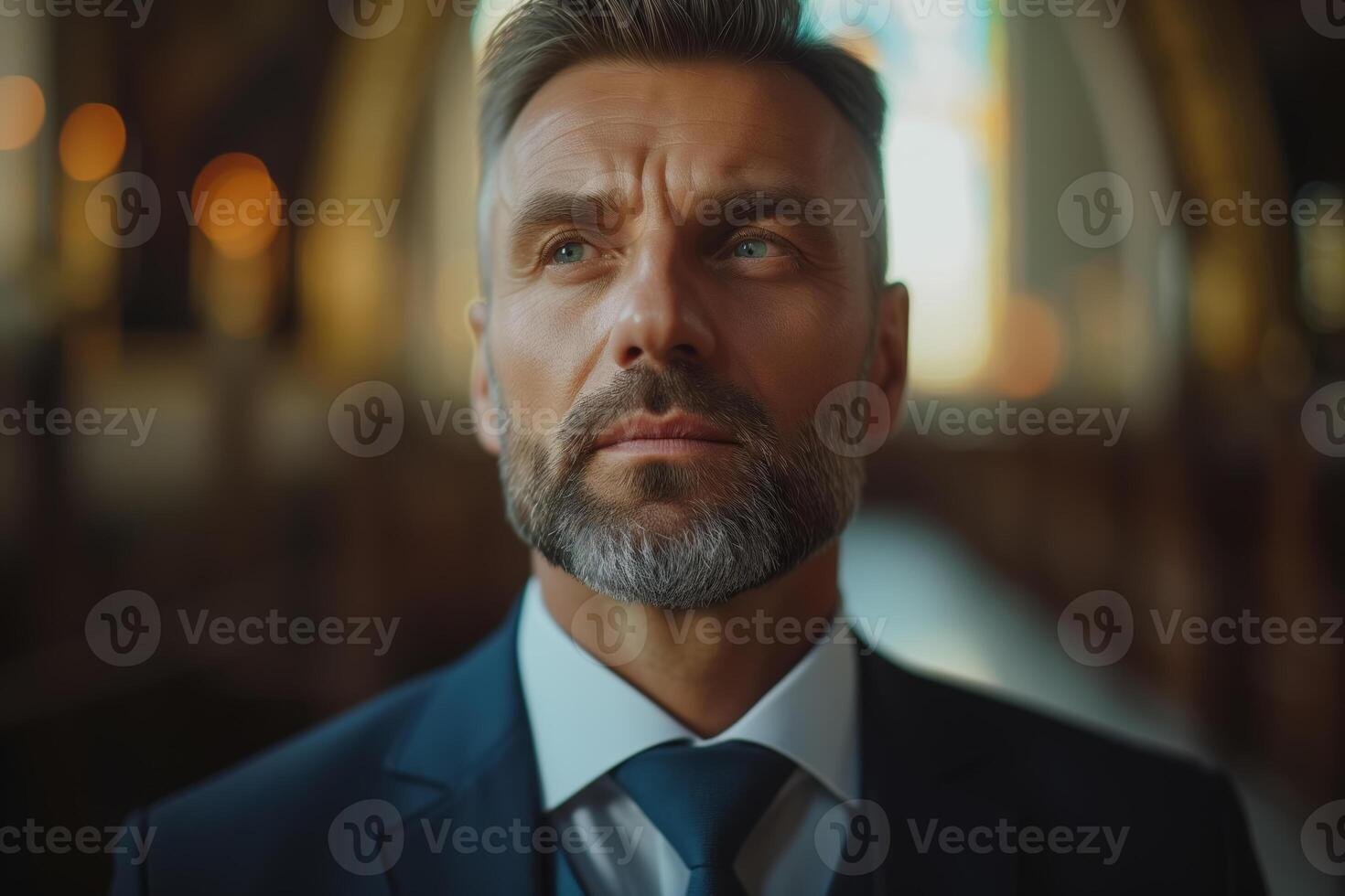AI generated A handsome middle-aged man or groom, dressed in a stylish suit and tie, stands in a church and looks contemplatively into the distance photo