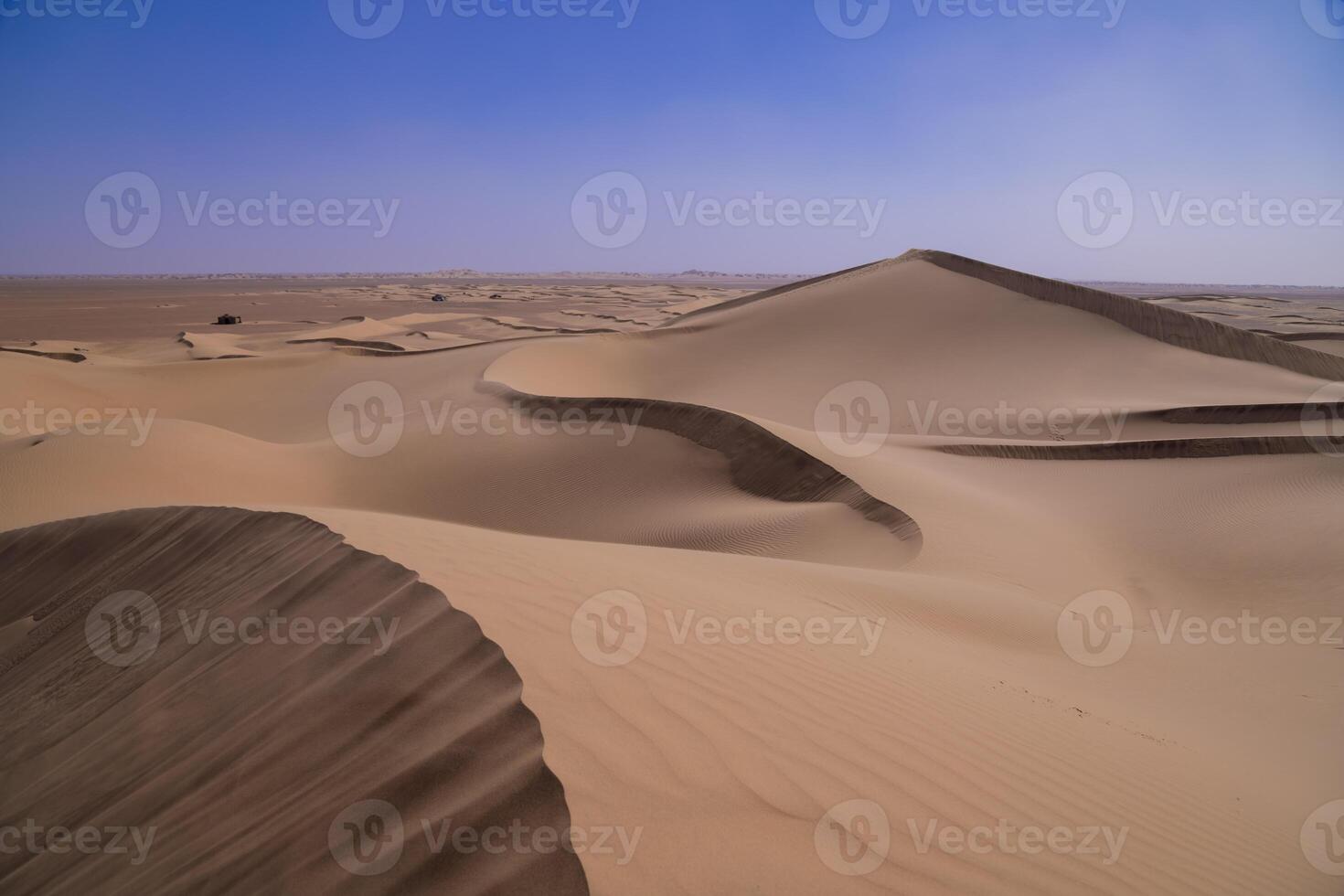 A sand dune of sahara desert at Mhamid el Ghizlane in Morocco telephoto shot photo