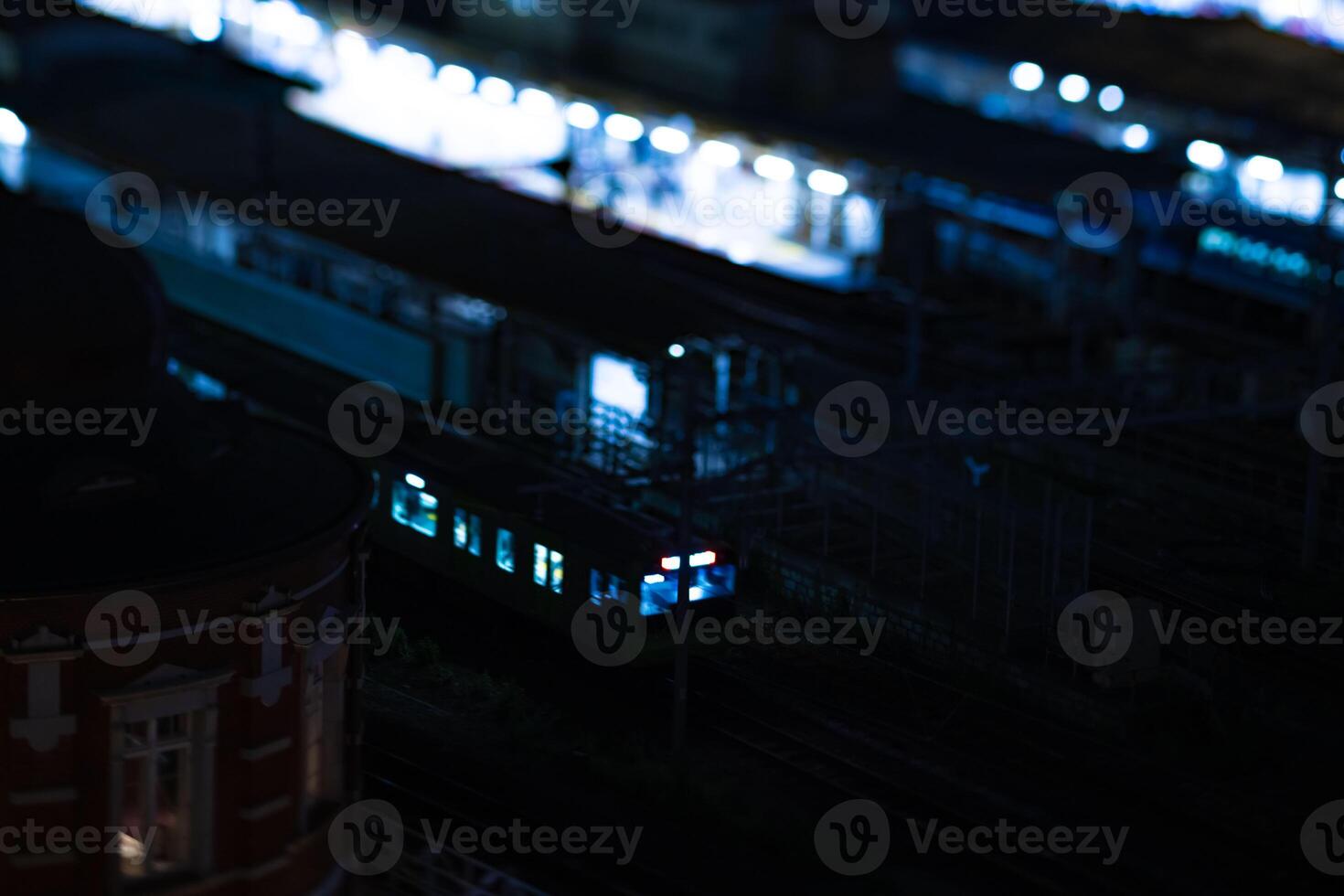 A night miniature cityscape in front of Tokyo station tiltshift photo