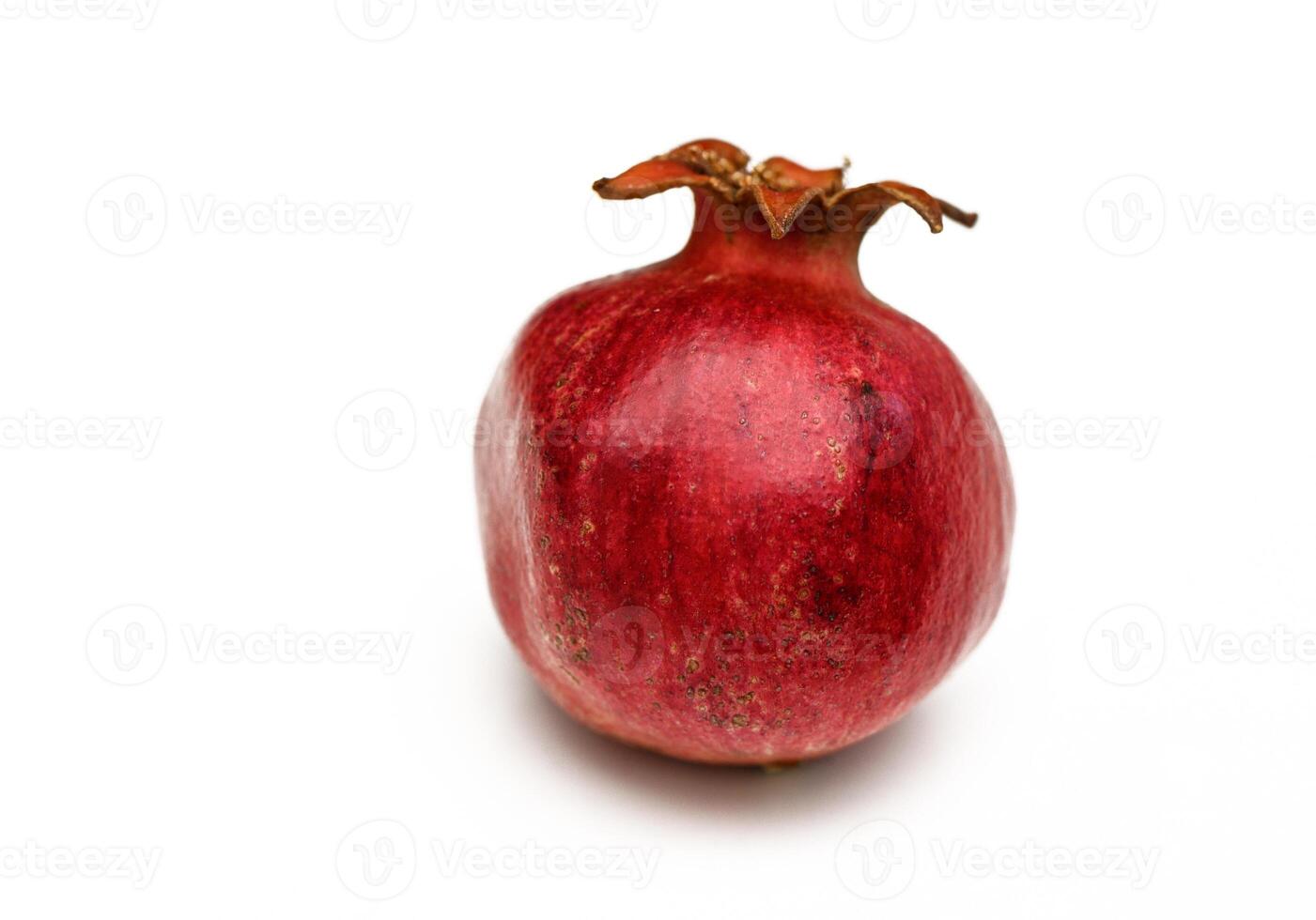 overripe pomegranate isolated on white background 1 photo