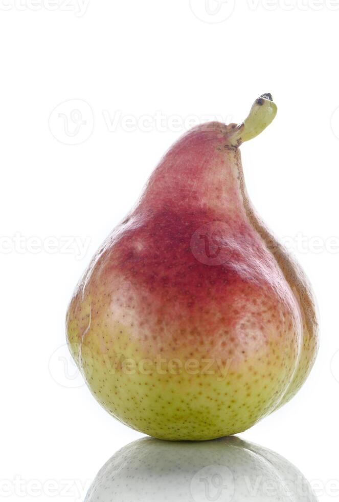 An upright ripe juicy golden and red pear isolated against a flat background. 2 photo