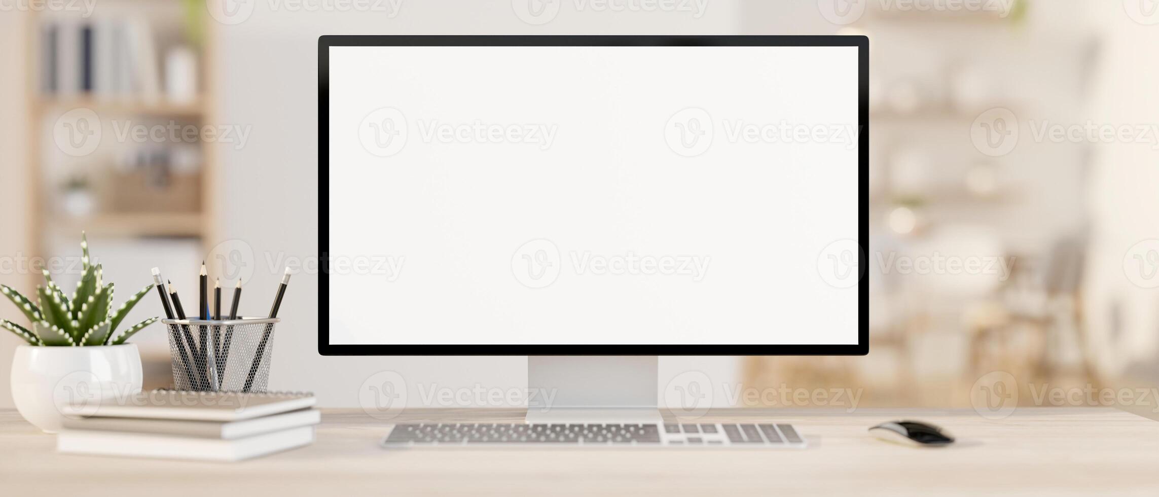 A computer mockup on a wooden table in a contemporary minimalist white office or home office. photo