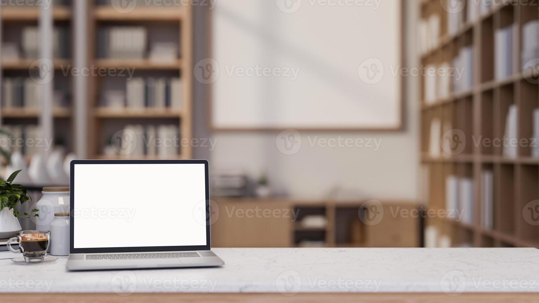 A white tabletop features a laptop mockup in a neutral contemporary living room or home office. photo