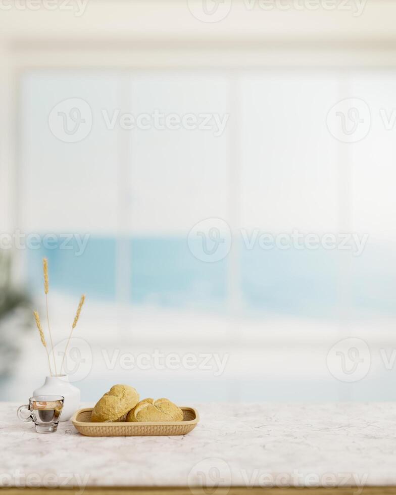 A bread basket and a coffee cup on a white marble table in a modern white beach house living room. photo