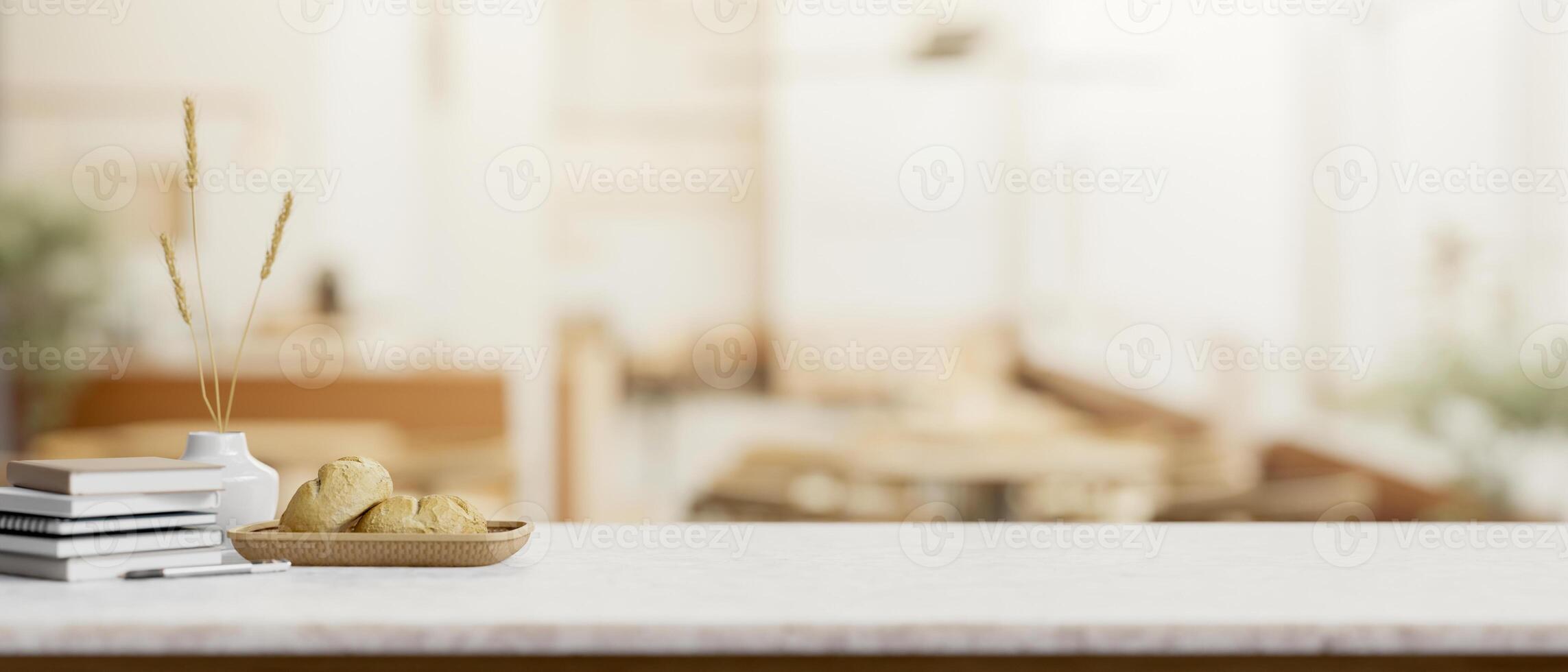 A presentation space for display products on a white tabletop in a cosy, Scandinavian coffee shop. photo